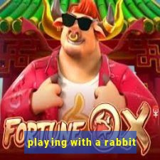 playing with a rabbit